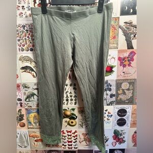 Olive green size large leggings with lace design. Great condition.